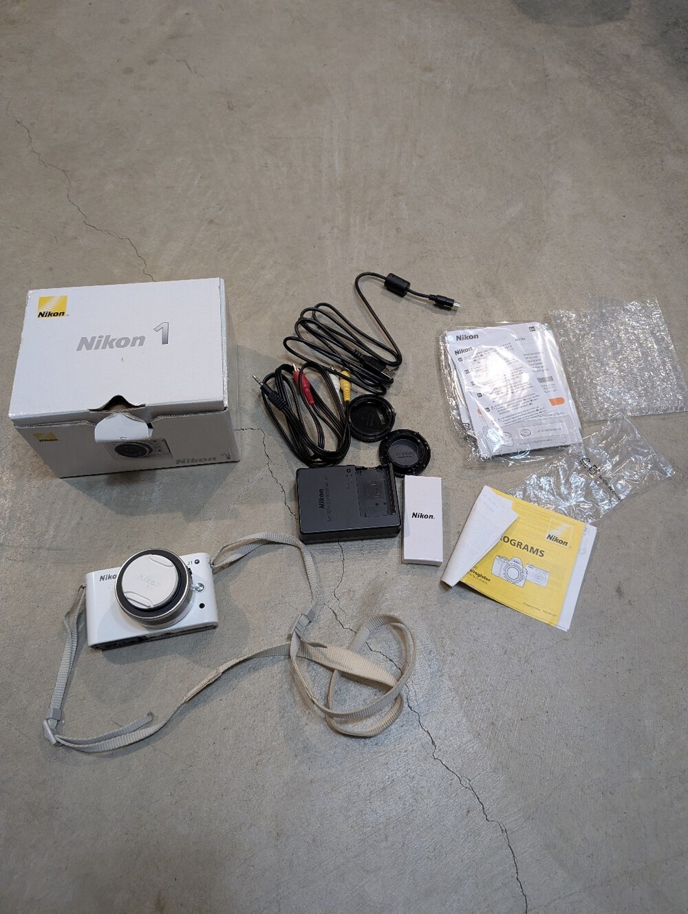 Nikon J1 Mirrorless Digital Camera Turns On Tested Flaw